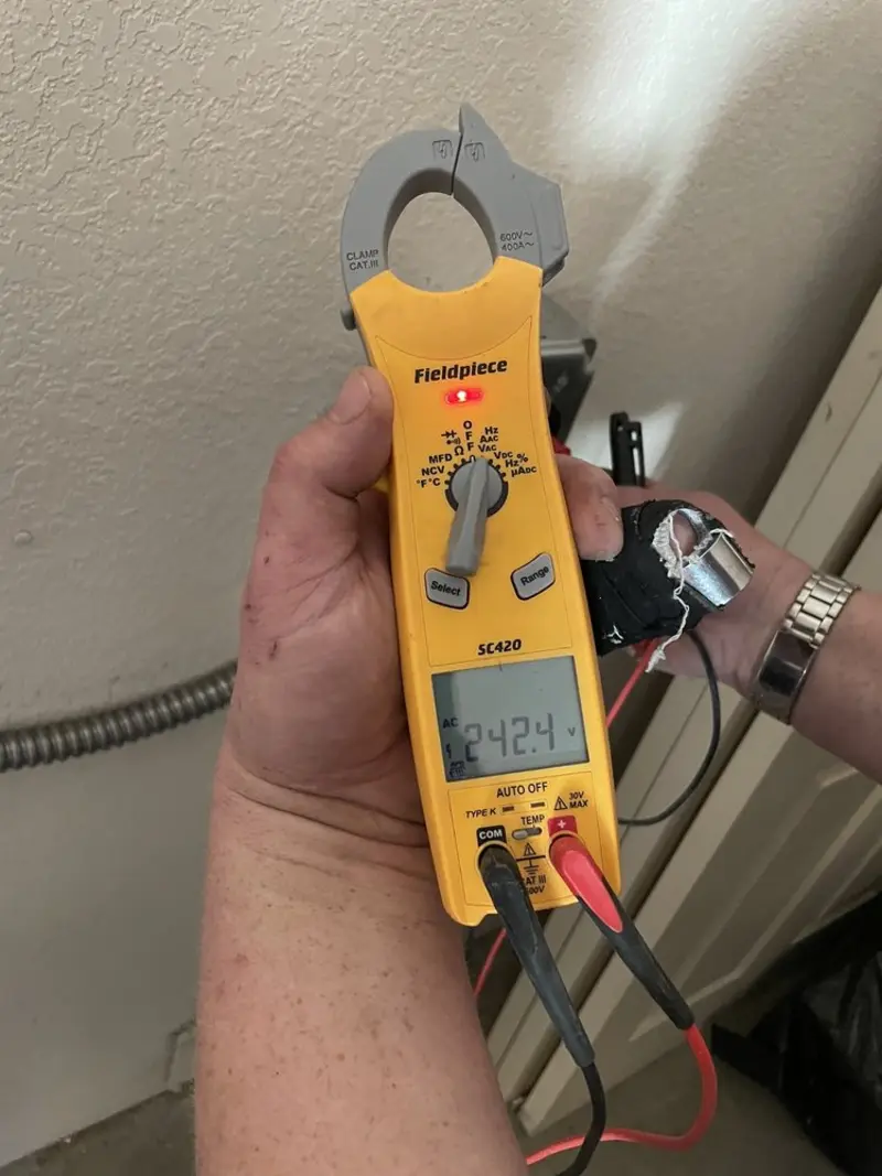 Voltage testing with clamp meter during Circuit Breaker Repair in Mount Oliver